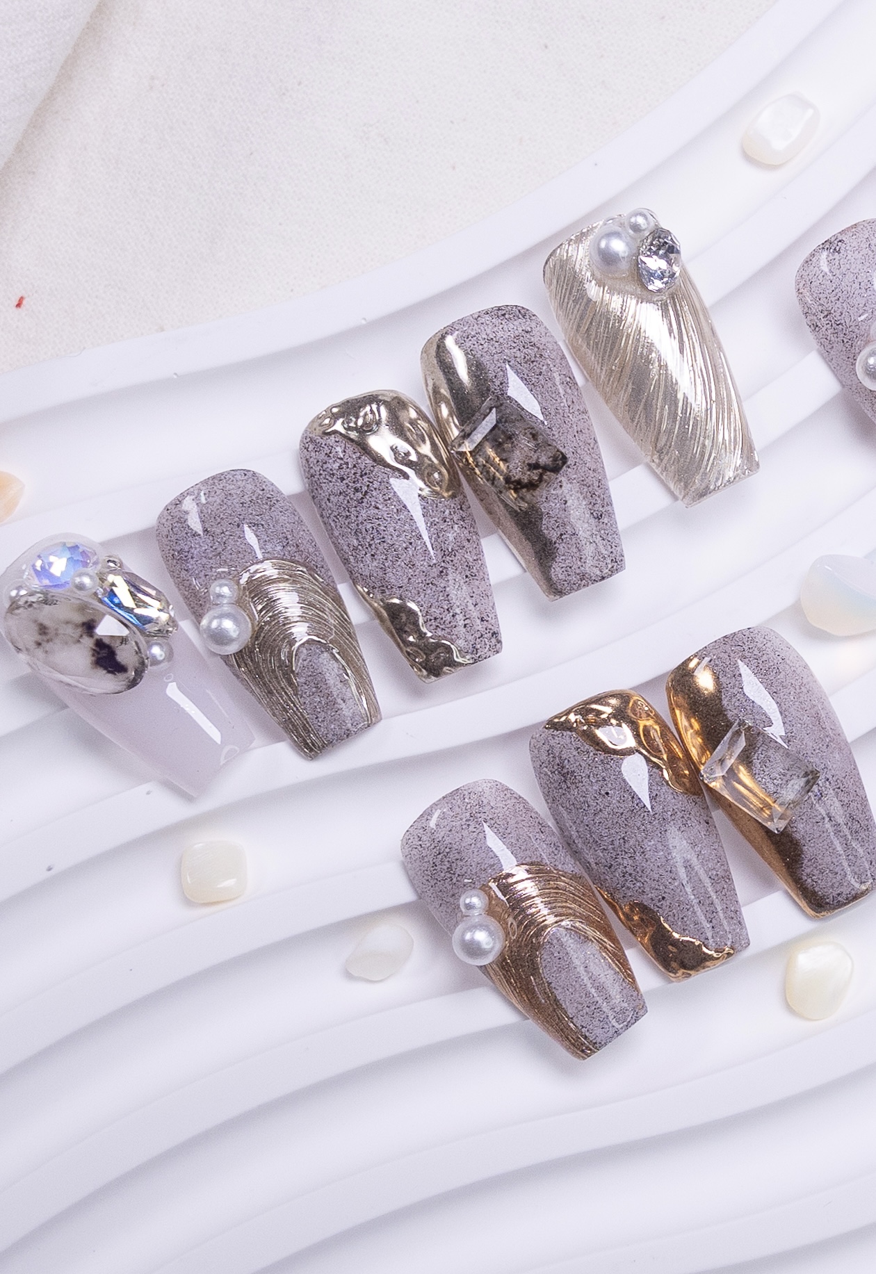 DIAMI chrome palette and ocean-inspired nail art detail